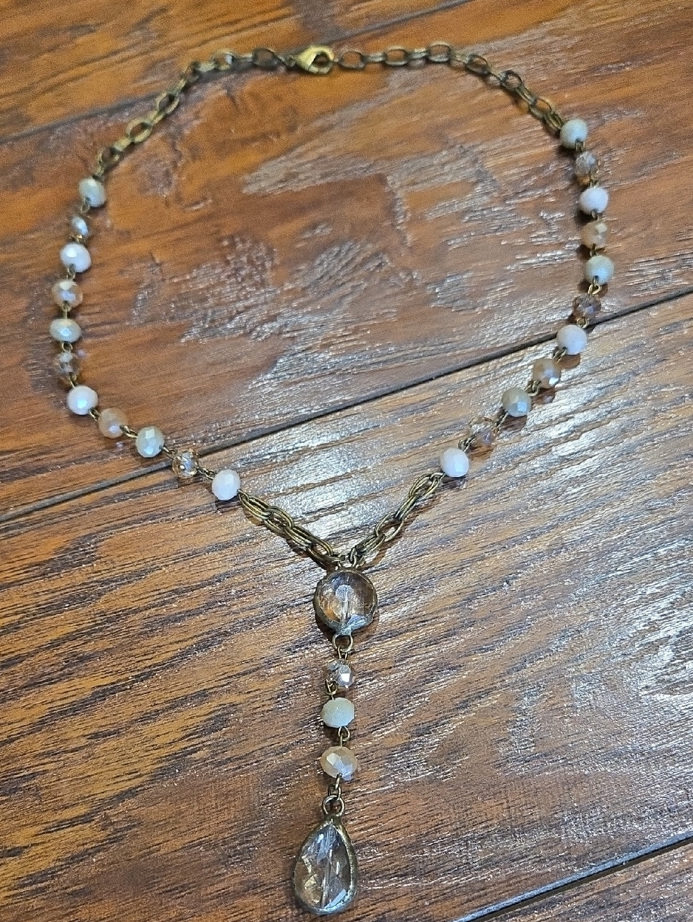 Gold-Tone Necklace with White Beads and Clear Crystal Drop